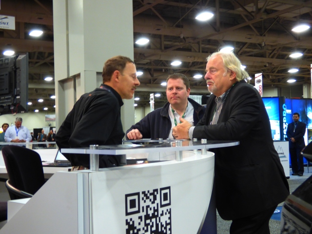 At SME, Mintec's Frank Olivieri (left) fields questions from International Mining's John Chadwick (right) and Paul Moore.